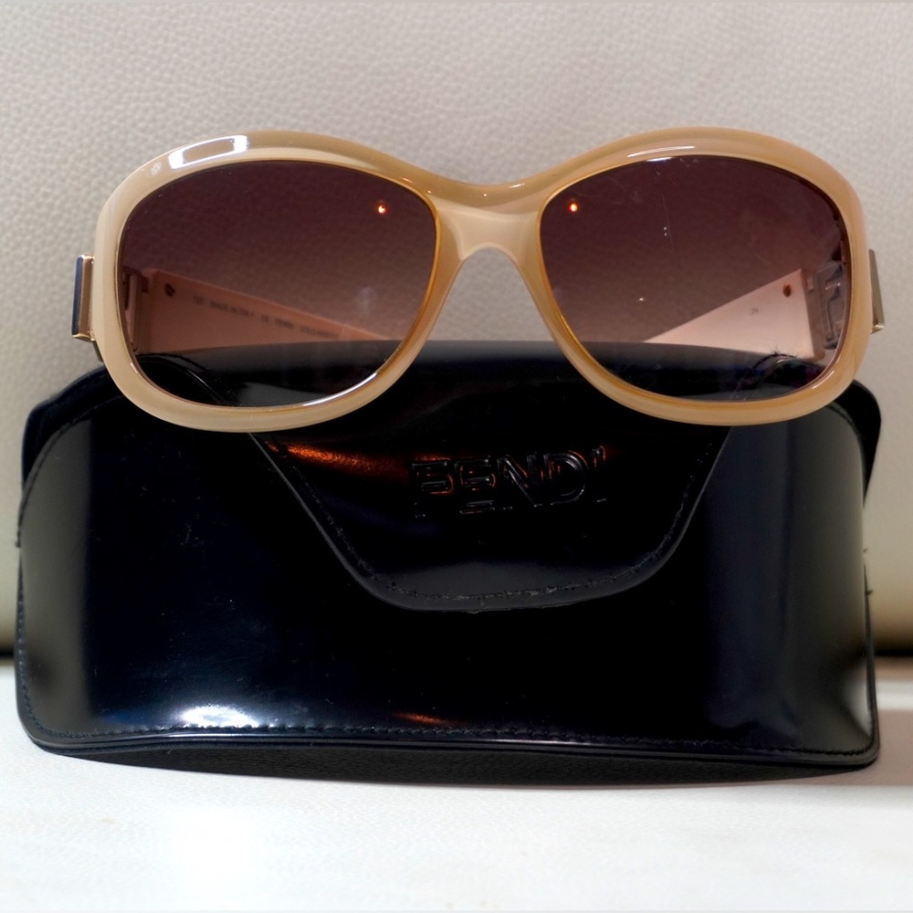 Authentic Fendi Sunglasses in tan signature FF on sides